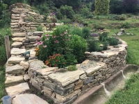 Rock garden from its side - with flowers